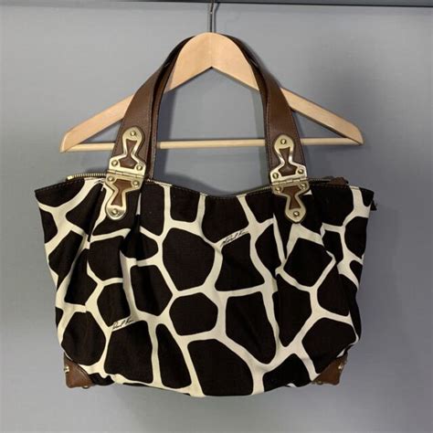 michael kors animal print purses|Michael Kors cow print purse.